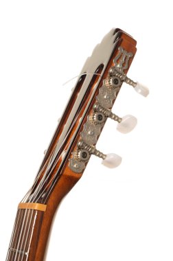 Classical guitar fretboard and machine head isolated on a pure white background  