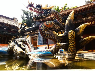 dragon sculpture at the temple in kunming, china, asia