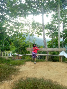 a man is standing looking straight