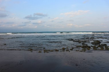 Sea Ocean Wave hit the rock at beach. Seascape. Focus on foreground