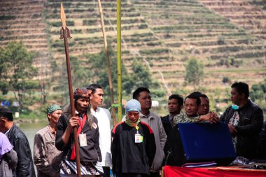 Dieng / Indonesia - August 1, 2015: Dieng Culture Festival, Tourists follow the dreadlocks procession during the Dieng Culture Festival event at Dieng, Banjarnegara district, Central Java