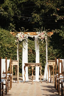 Rustic wedding aisle in a garden. 