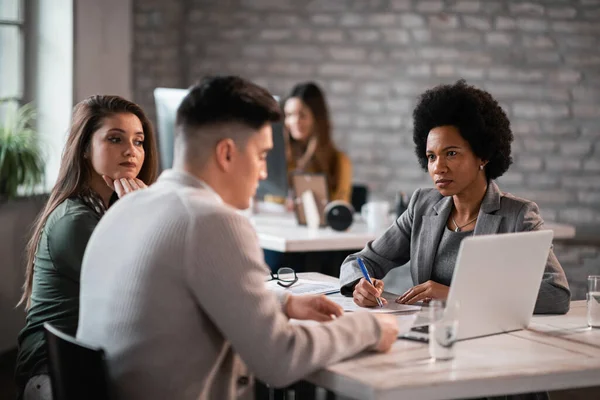 African American Financial Advisor Having Meeting Young Couple Talking Investment — Photo