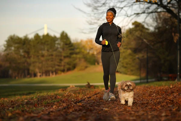 Happy African American Woman Jogging Her Dog Nature — Stock Fotó