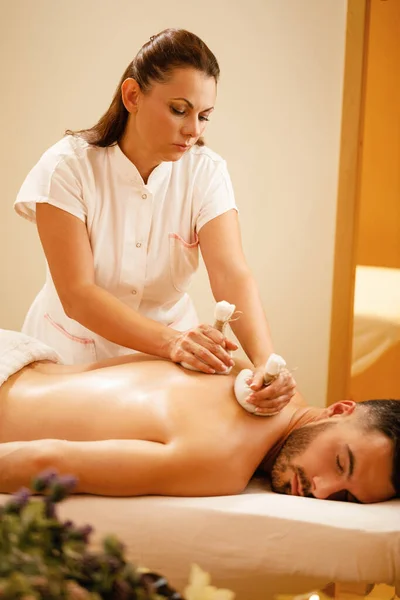 Female Therapists Massaging Back Man Thai Herbal Compress Health Spa — 图库照片