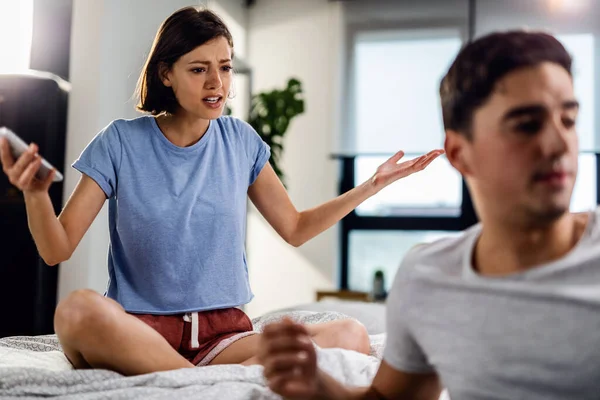 Young Couple Arguing Bedroom Focus Frustrated Woman Who Disbelief Because — 스톡 사진