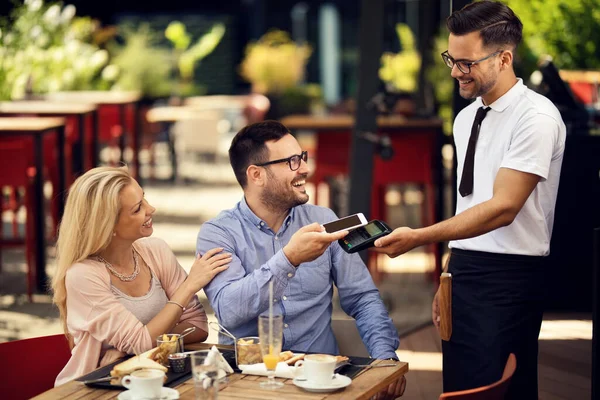 Happy Waiter Taking Smart Phone Contactless Payment His Guests Bar — Stock Photo, Image