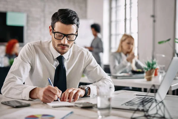 Young Businessman Writing Notebook While Working Business Reports Office People — Stock Fotó