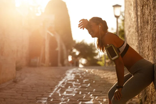 Happy Athletic Woman Feeling Exhausted Taking Break While Jogging City — Stock Fotó