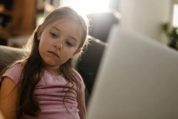 Pensive Girl Using Laptop Thinking Something While Relaxing Living Room — Stockfoto