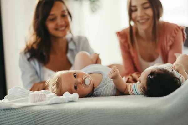 Happy Mothers Enjoying Babies Home Baby Boy Turning Camera — Stok fotoğraf