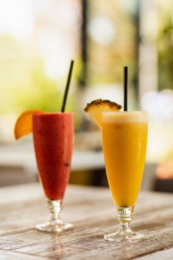 Fresh fruit cocktails in glasses on the table. 