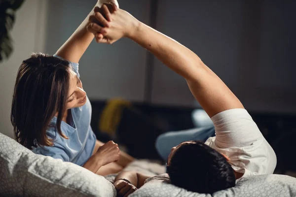 Young Couple Having Fun While Holding Hand Communicating Bedroom — Stockfoto