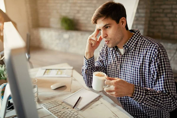 Young Entrepreneur Feeling Worried While Working Computer Drinking Coffee Office — Photo