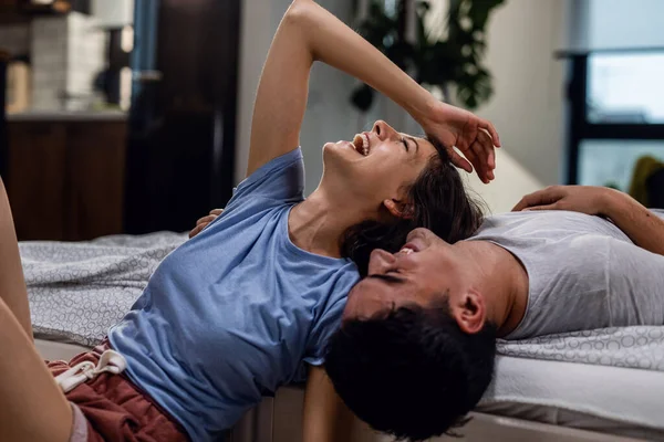 Carefree Couple Having Fun Laughing While Talking Something Bedroom — Foto Stock