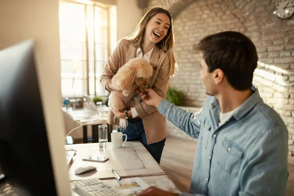 Young Happy Businesswoman Her Male Coworker Having Fun Dog While — Φωτογραφία Αρχείου