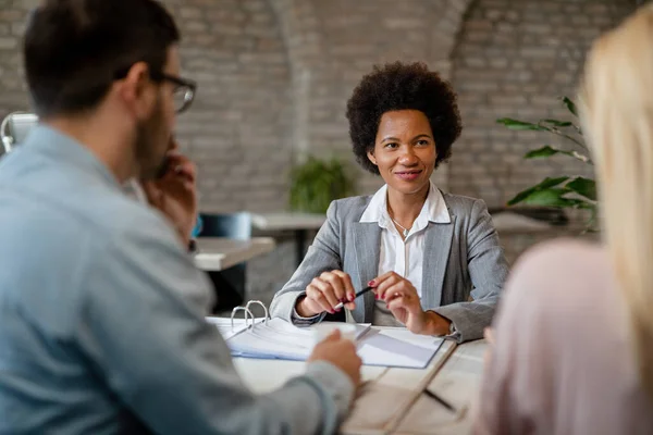 Happy African American Financial Advisor Having Meeting Couple Office — ストック写真