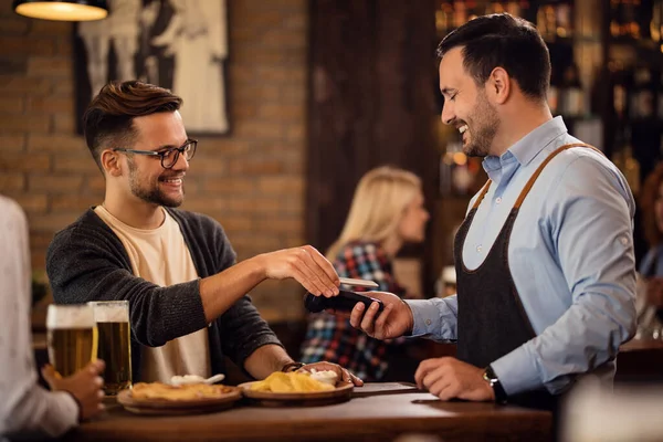 Happy Man Using Smart Phone Paying Bill Contactless Payment Pub — Foto de Stock