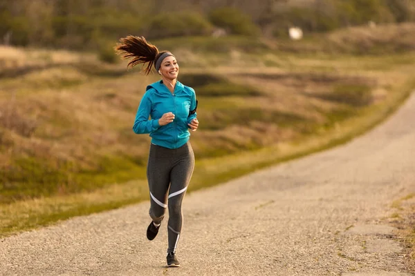 Happy Female Runner Jogging Road Nature Dawn Copy Space — Stock Fotó