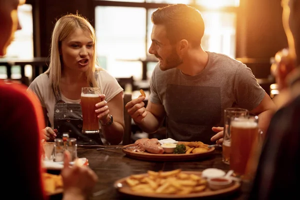 Group Friends Talking While Drinking Beer Eating Dining Table Restaurant — Foto de Stock