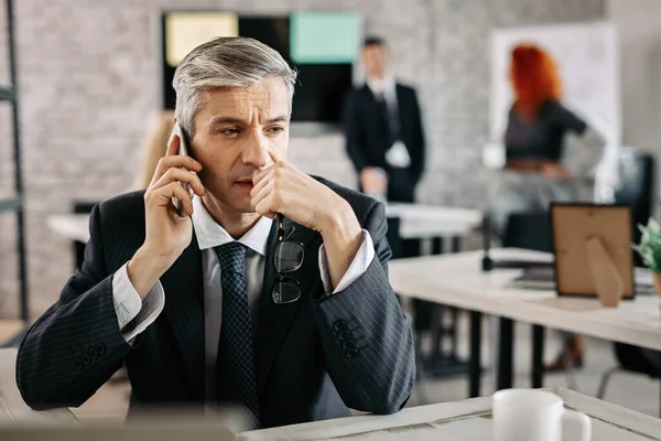 Worried Businessman Thinking While Making Phone Call Mobile Phone Office — Stock Fotó