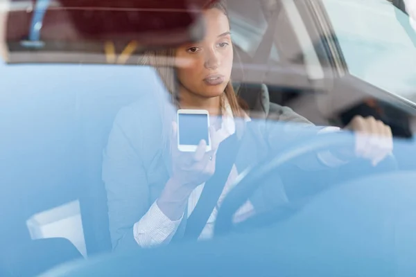 Young Pensive Businesswoman Making Phone Call While Driving Car View — 图库照片