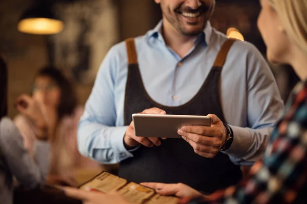 Close Happy Waiter Taking Order Touchpad Talking Female Customer Bar — Stockfoto