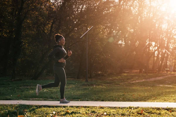 Happy Black Sportswoman Running Sunny Day Autumn Park Copy Space — Stock Fotó