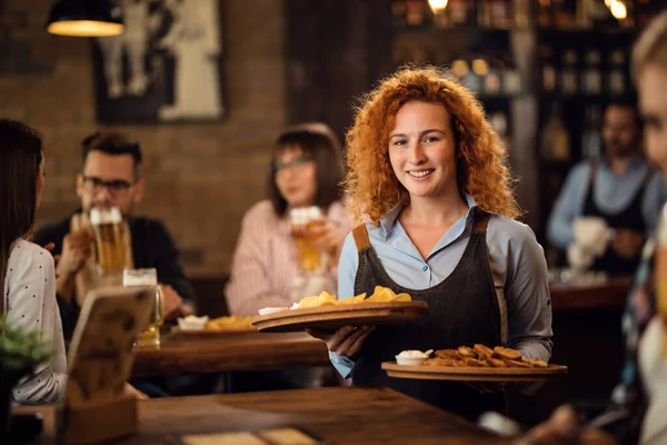 Happy Redhead Waitress Serving Customers Restaurant Bringing Food Table — Stockfoto