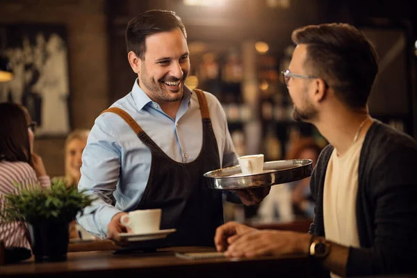 Happy Waiter Serving Coffee Communicating Male Guest Bar — Fotografia de Stock
