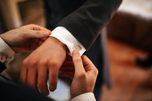 Close Man Helping Groom Adjust His Suit Sleeves His Wedding — Photo