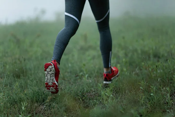 Unrecognizable Athletic Woman Running Grass Foggy Weather — Stock Fotó