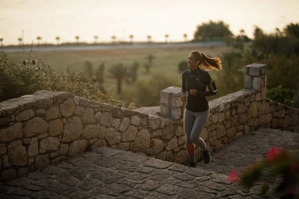 Full Length Happy Athletic Woman Running Morning Nature — Stockfoto