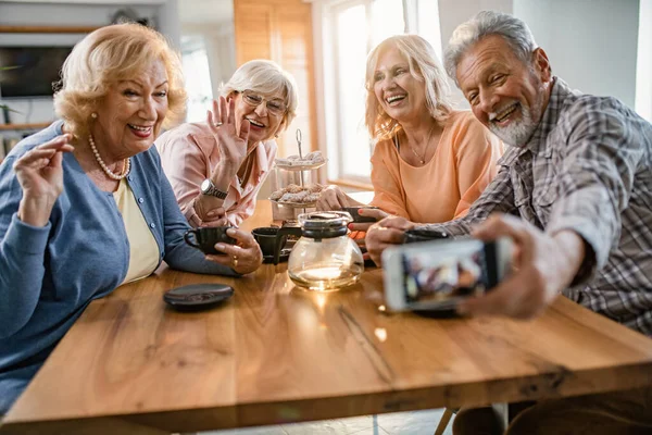 Group Happy Mature Friends Using Smart Phone Taking Selfie While — Photo