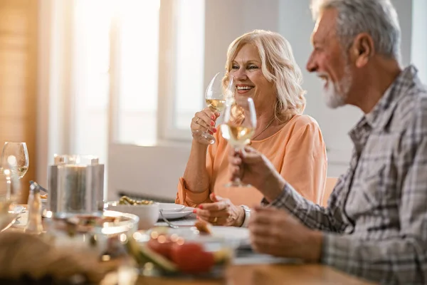 Happy Senior Couple Enjoying Glass Wine Lunch Time Dining Table — Foto de Stock