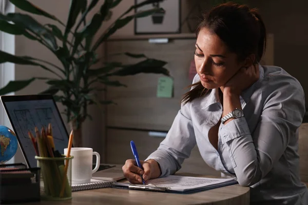 Pensive Businesswoman Filling Out Documents While Finishing Paperwork Office — Photo