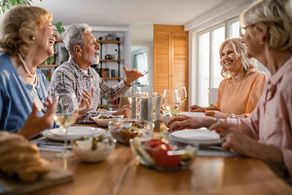 Group Happy Senior Friends Having Lunch Together Talking Dining Table — Foto de Stock