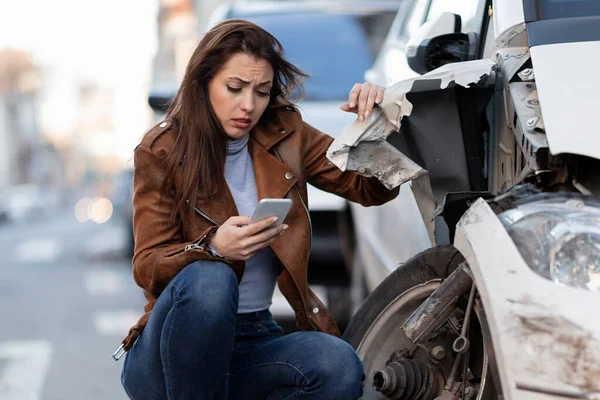 Young Sad Woman Text Messaging Smart Car Crash Road — 图库照片