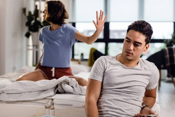 Young Couple Arguing Bedroom Focus Worried Man Sitting Bed Thinking — Stockfoto