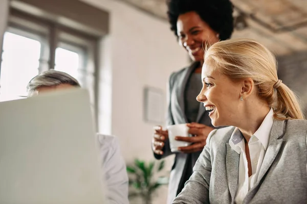 Happy Mid Adult Businesswoman Talking Her Workers Laughing While Working — Foto Stock