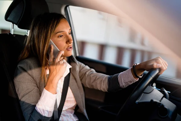 Young Businesswoman Talking Cell Phone While Driving Car Work — 图库照片