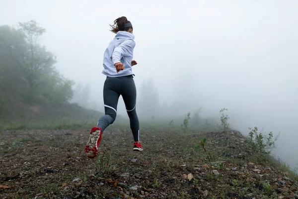 Rear View Motivated Sportswoman Running Nature Foggy Morning Copy Space — Stock Fotó