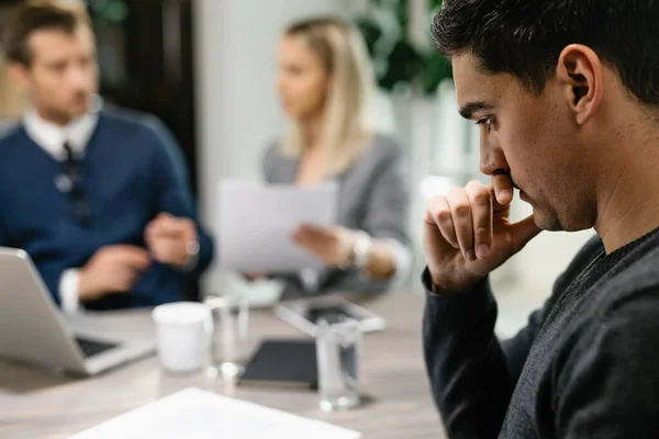 Worried Man Contemplating While His Wife Talking Financial Advisor Meeting — Photo