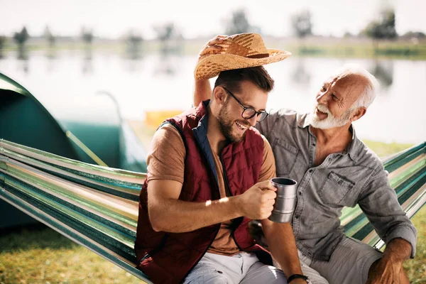Happy Senior Man Having Fun His Adult Son While Camping — ストック写真