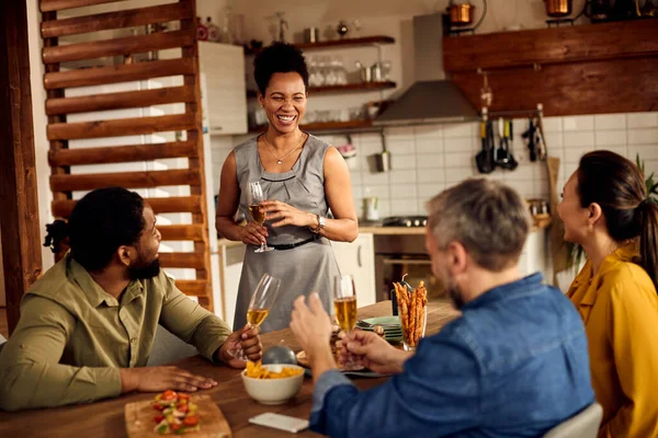 Happy African American Woman Talking While Drinking Wine Her Friends — Stockfoto