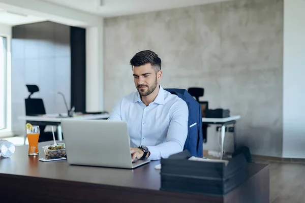 Young Businessman Typing Mail Computer While Working Office — Stock Fotó