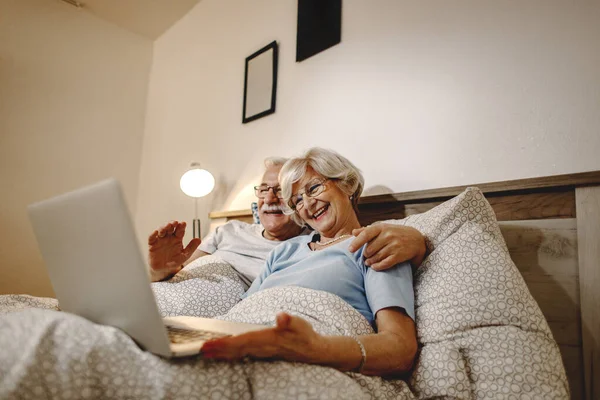 Low Angle View Happy Senior Couple Relaxing Bedroom While Making — 스톡 사진