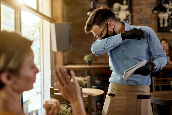 Waiter Sneezing Elbow While Serving Customer Cafe — 스톡 사진