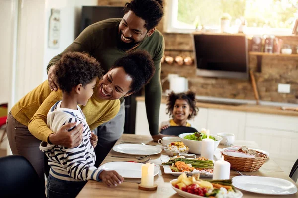 Happy African American Family Talking While Setting Table Lunch Dining — Foto de Stock