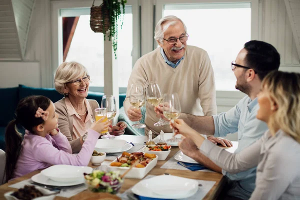 Happy Multi Generation Family Toasting Lunch Time Dining Table Focus — Stock Fotó
